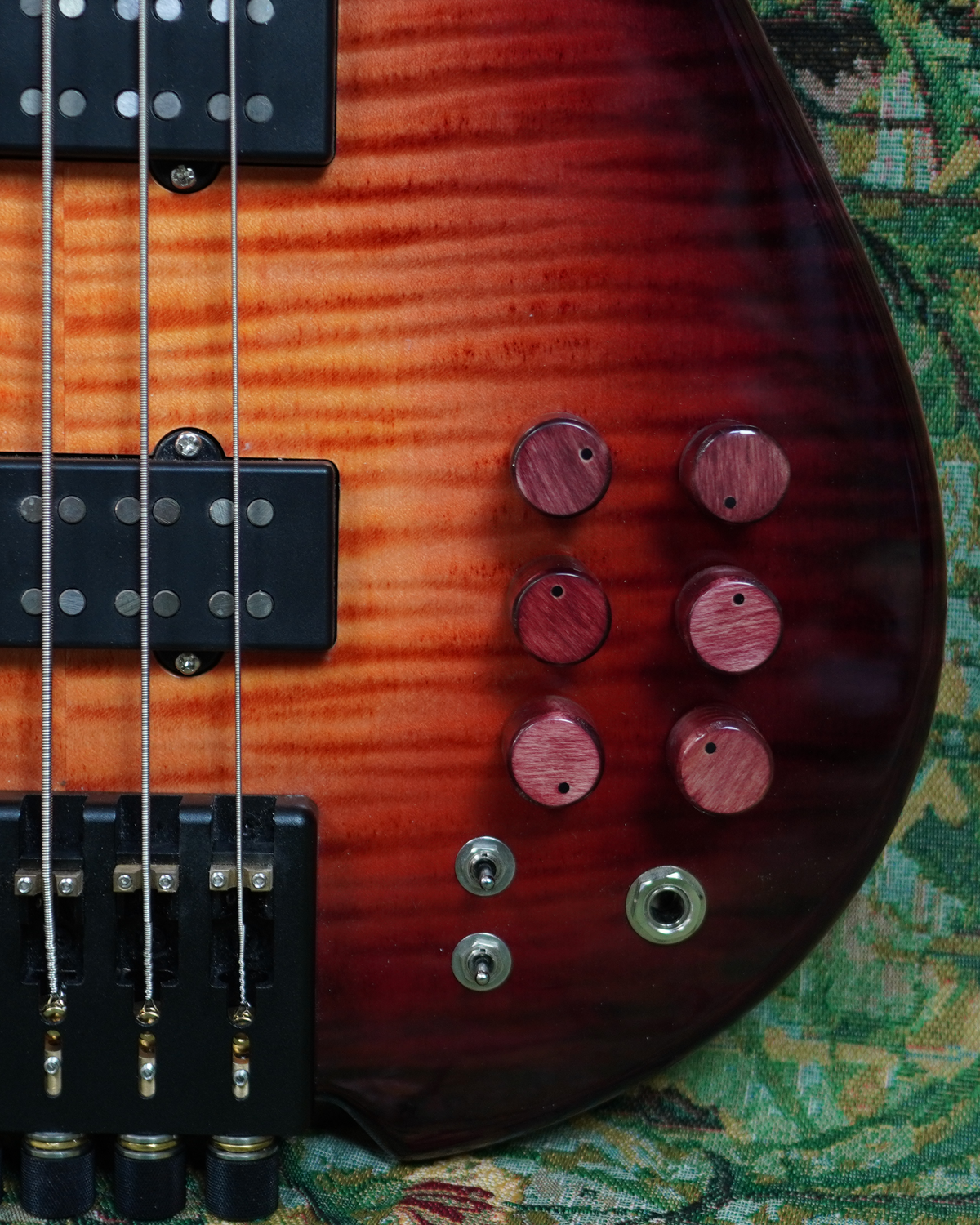 Raw wood and workshop materials for Baboomin bass crafting