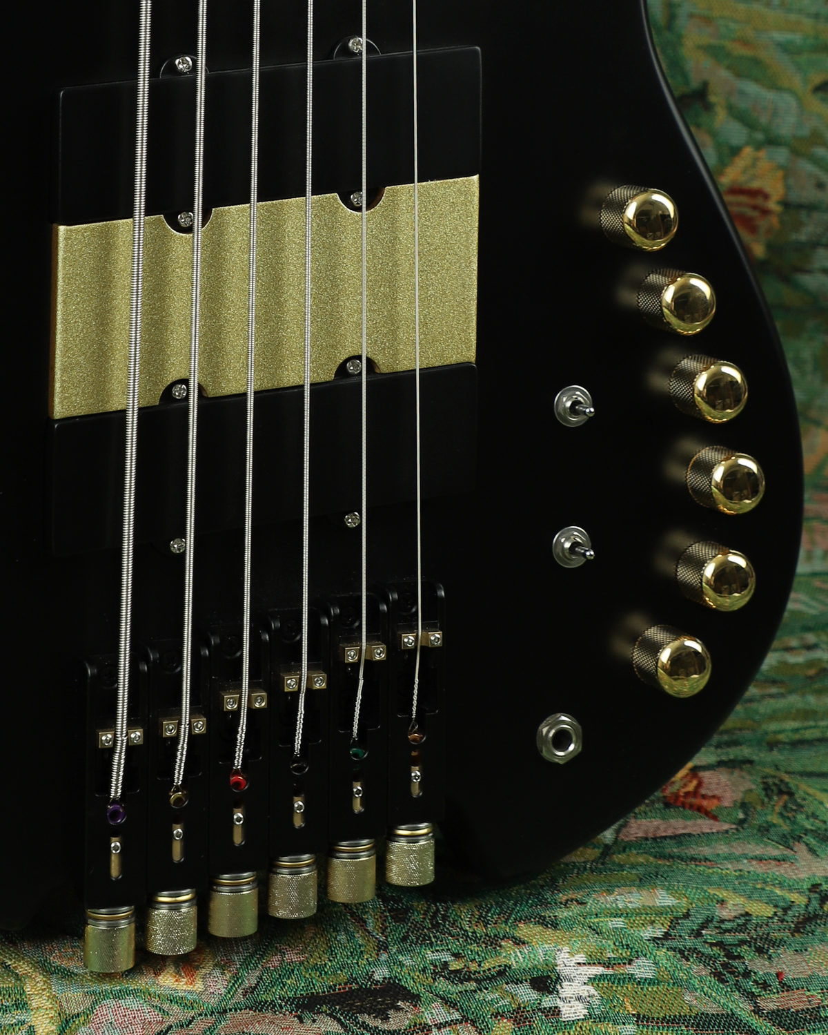 Raw wood and workshop materials for Baboomin bass crafting